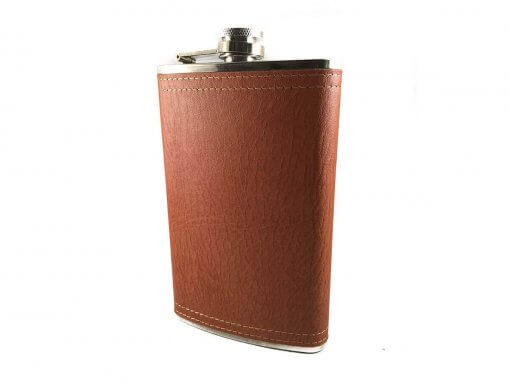 This flask holds 10 oz and features a brushed stainless steel finish wrapped in brown leather, a captive top to prevent loss and durable seamless construction. Specifications Capacity: 10 oz Color: Stainless Steel with Brown Leather Weight (approx): 140 g Size: 16 x 9.5 x 2.5 cm In Gift Box