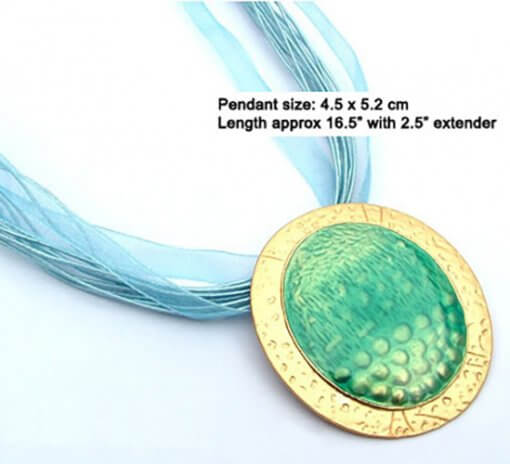 Oval enamel pendant necklace with silk cord